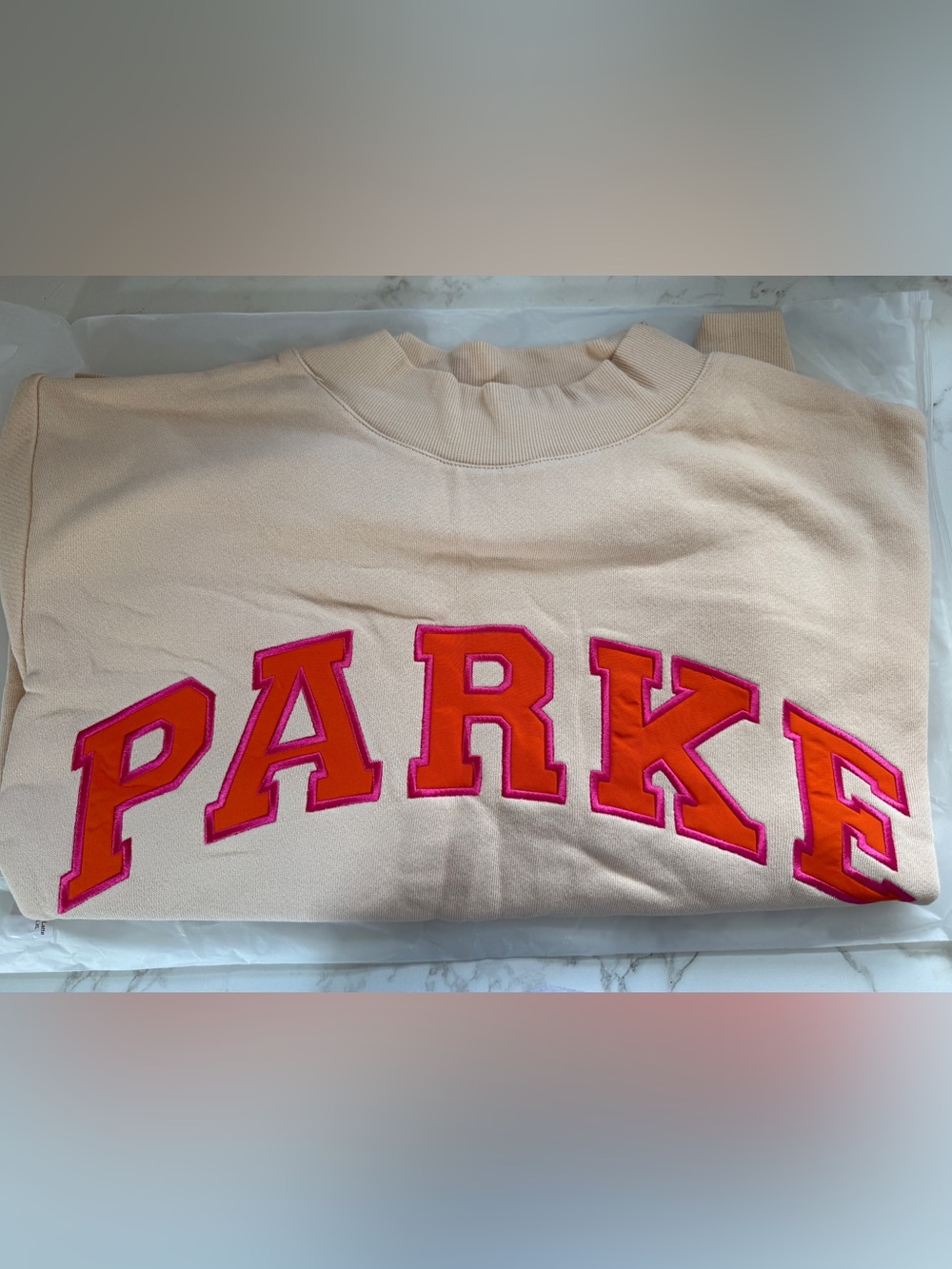 Parke x Dunkin’ Mockneck 
Latte + Orange L/XL